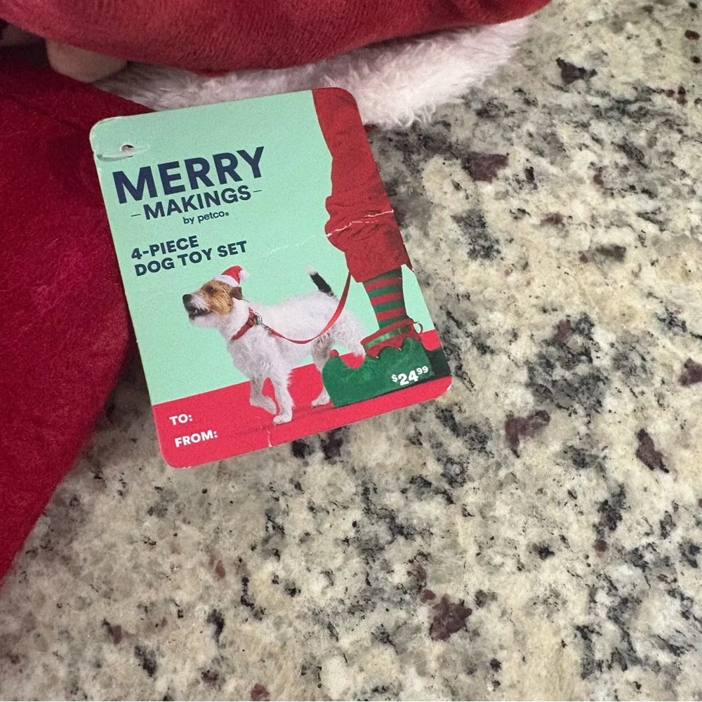 Merry Makings 4-piece dog toy set New with Tag in a red stocking
